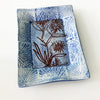 Handmade blue tray with abstract drawing of flower by Lorraine Oerth.
