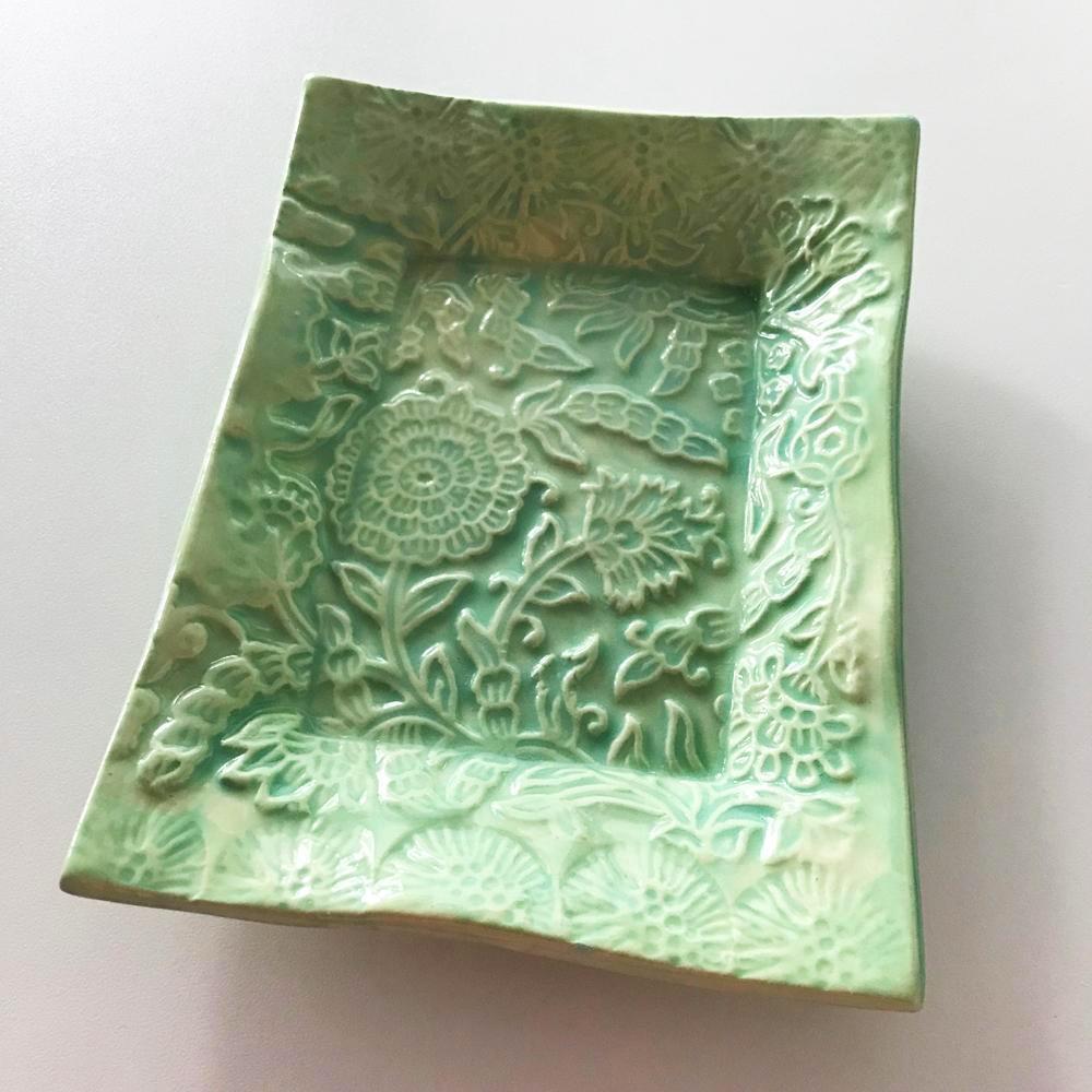 Handmade pottery tray in light green glaze.